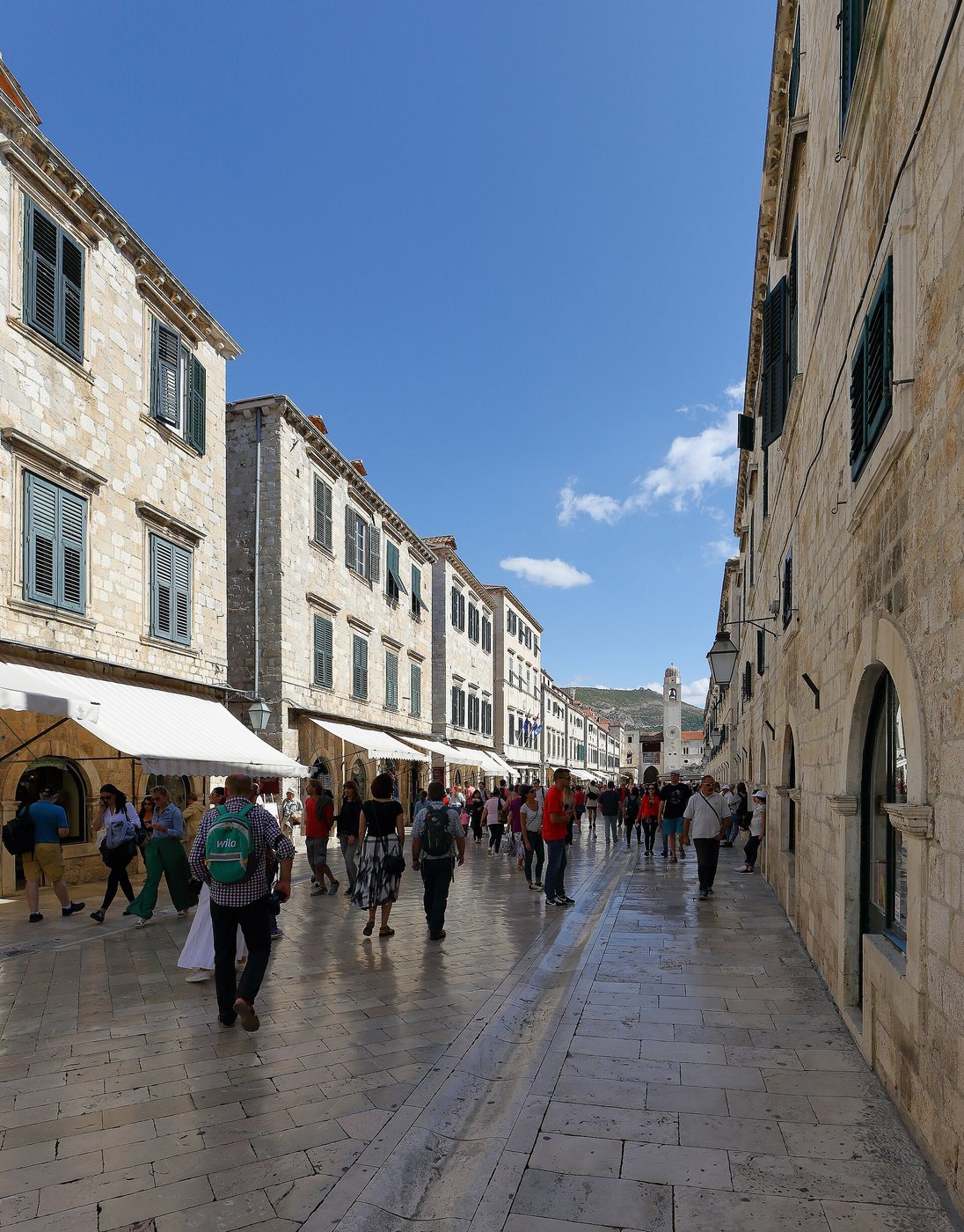 People walking along Stradun in Dubrovnik Old Town
