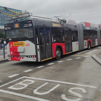 Double-articulated Škoda-Solaris trolleybus of Prague line 59 at Terminal 1 of Václav Havel Airport Prague