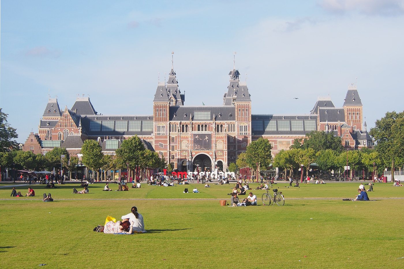Rijksmuseum viewed across the lawn at Museumplein in Amsterdam